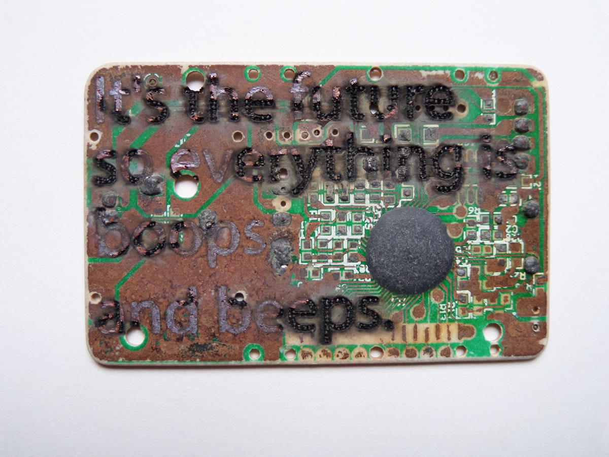 'The Future' - Laser engraved text from the internet on found circuit board, 2016